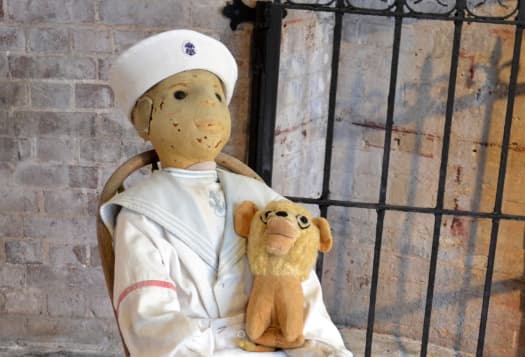 According to science, dolls are inanimate objects, but those who care for Robert the Doll and the thousands who visit him each year know better. Learn more on